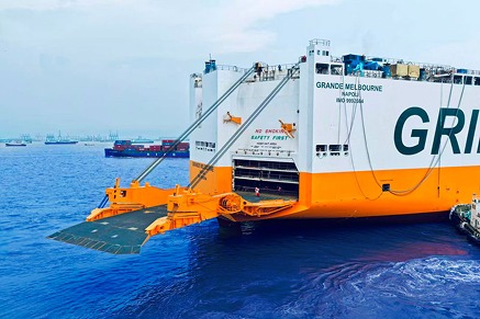 An image of a white and yellow ship.